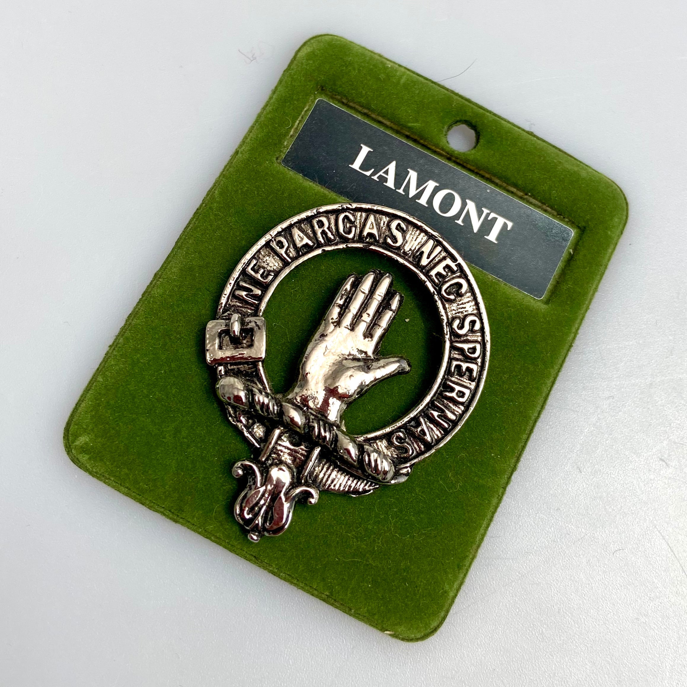 Lamont Clan Crest Badge in Pewter showcasing intricate design and durable construction, perfect for displaying clan heritage.