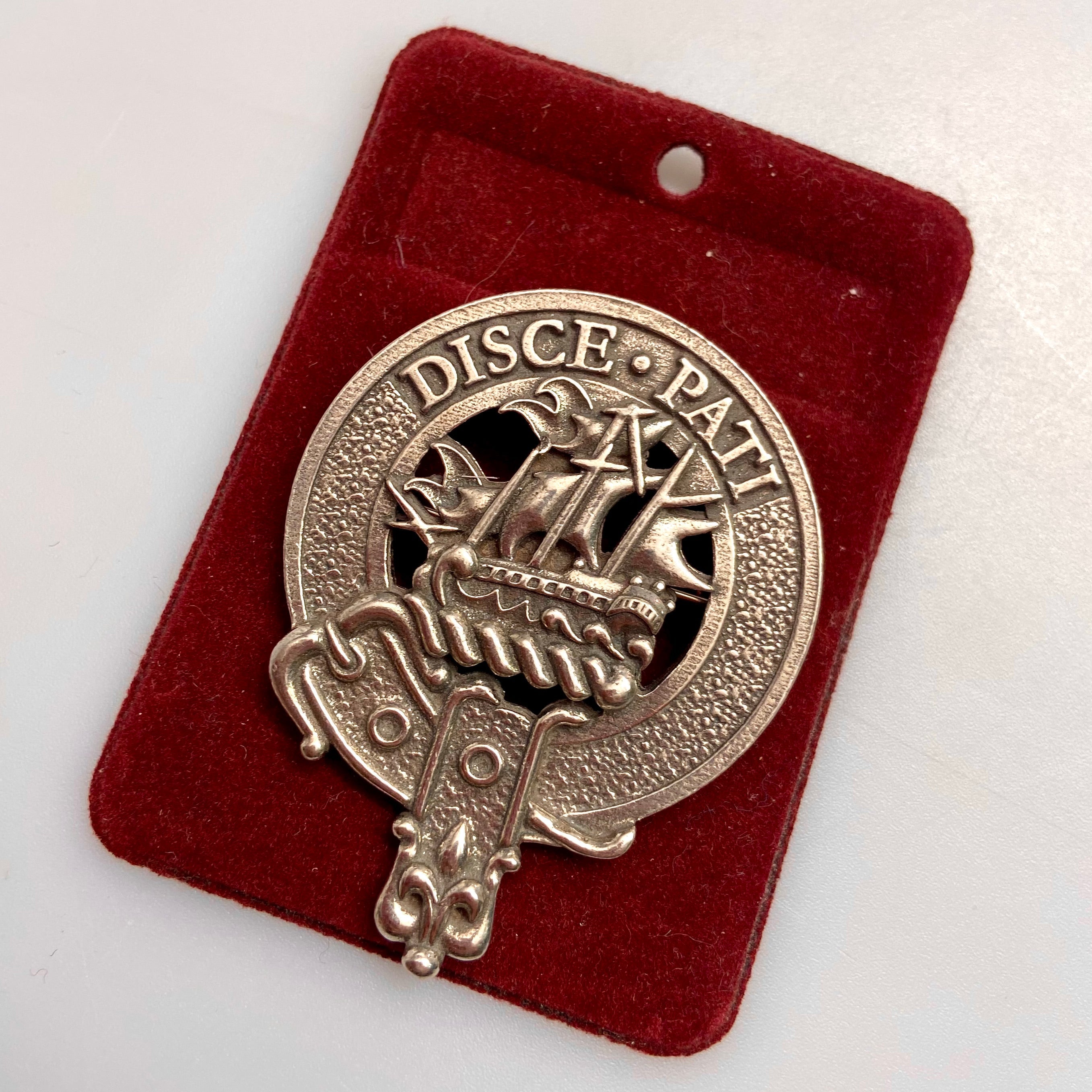 Duncan Clan Crest Badge in Pewter featuring a traditional belted design, perfect for wearing as a cap badge or large brooch pin.