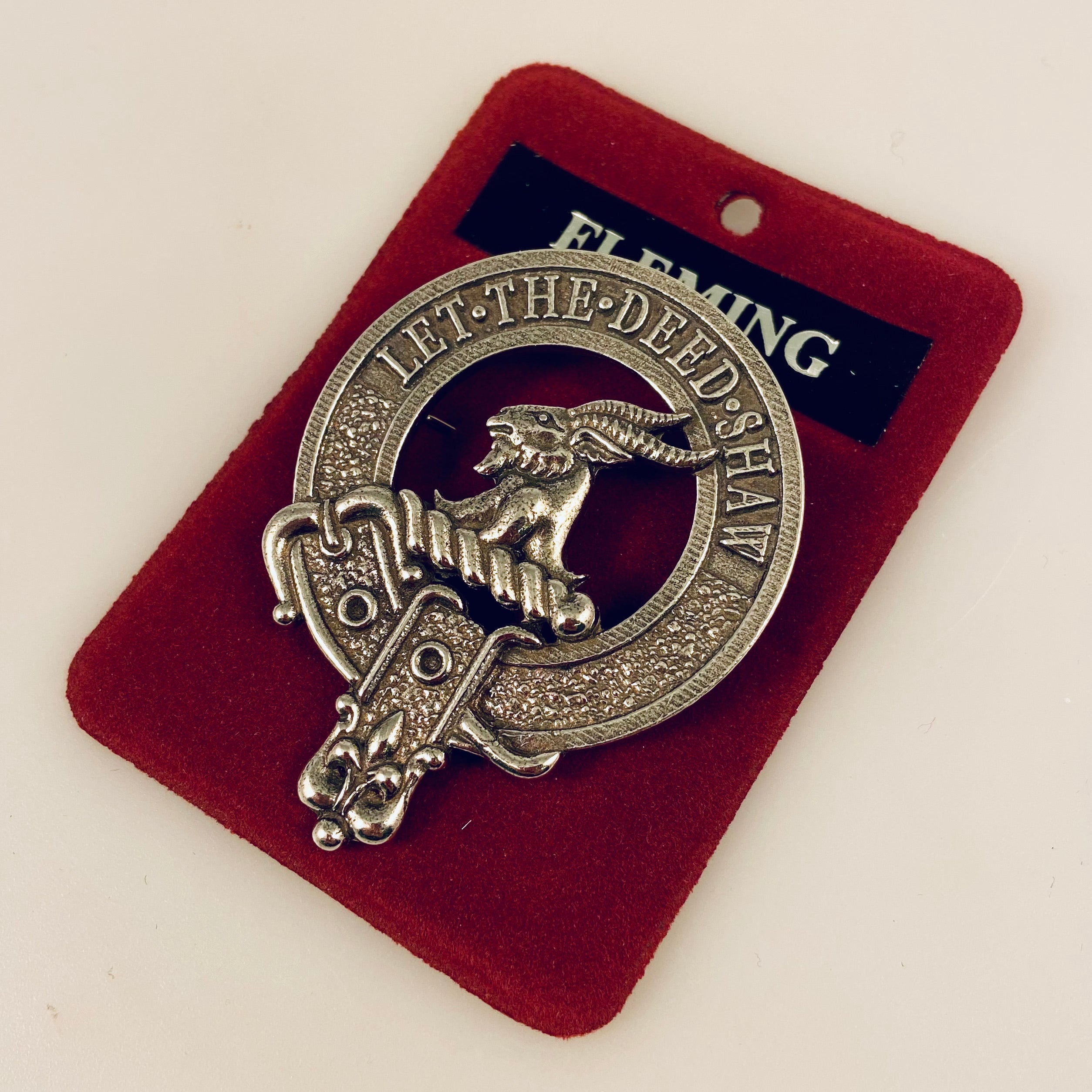 Fleming Clan Crest Badge in Pewter worn as a pin, featuring a traditional belted design and perfect for clan gatherings.
