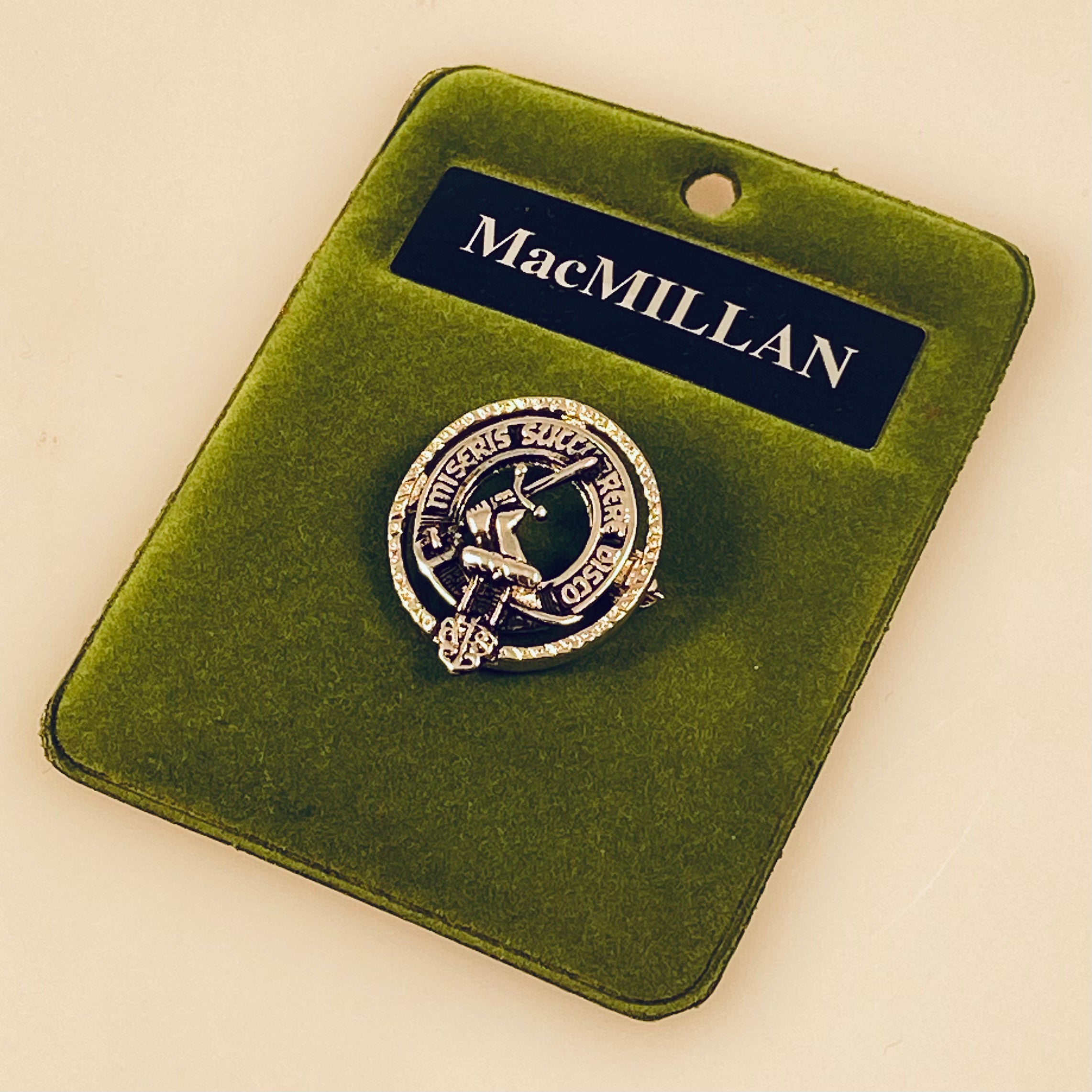 MacMillan Clan Crest Small Pewter Pin Badge showcasing its elegant design and antique palladium finish, perfect for Scottish heritage enthusiasts.
