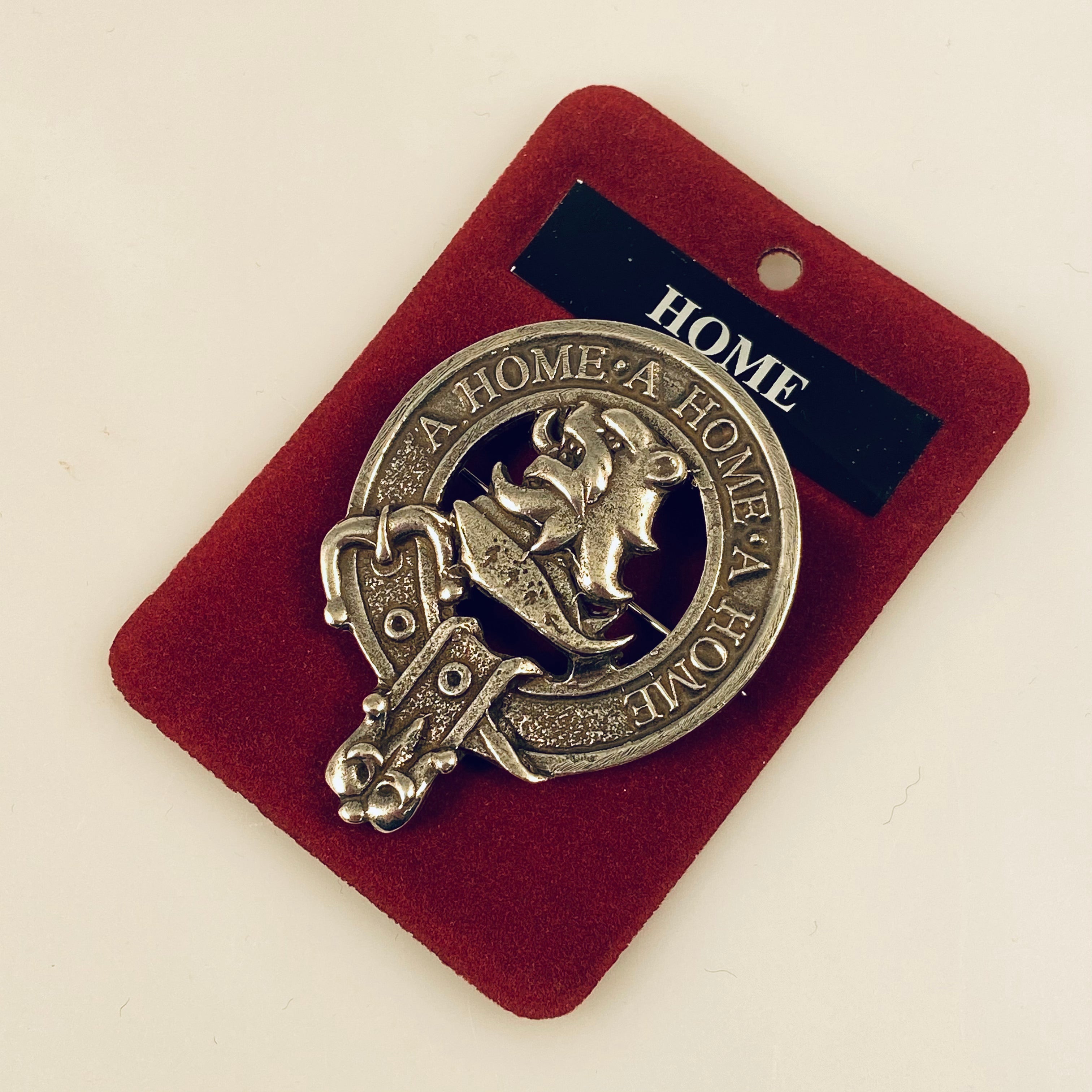 Home Hume Clan Crest Badge in Pewter, a stylish cap badge or brooch pin featuring a traditional belted clan design, perfect for gatherings and everyday wear.