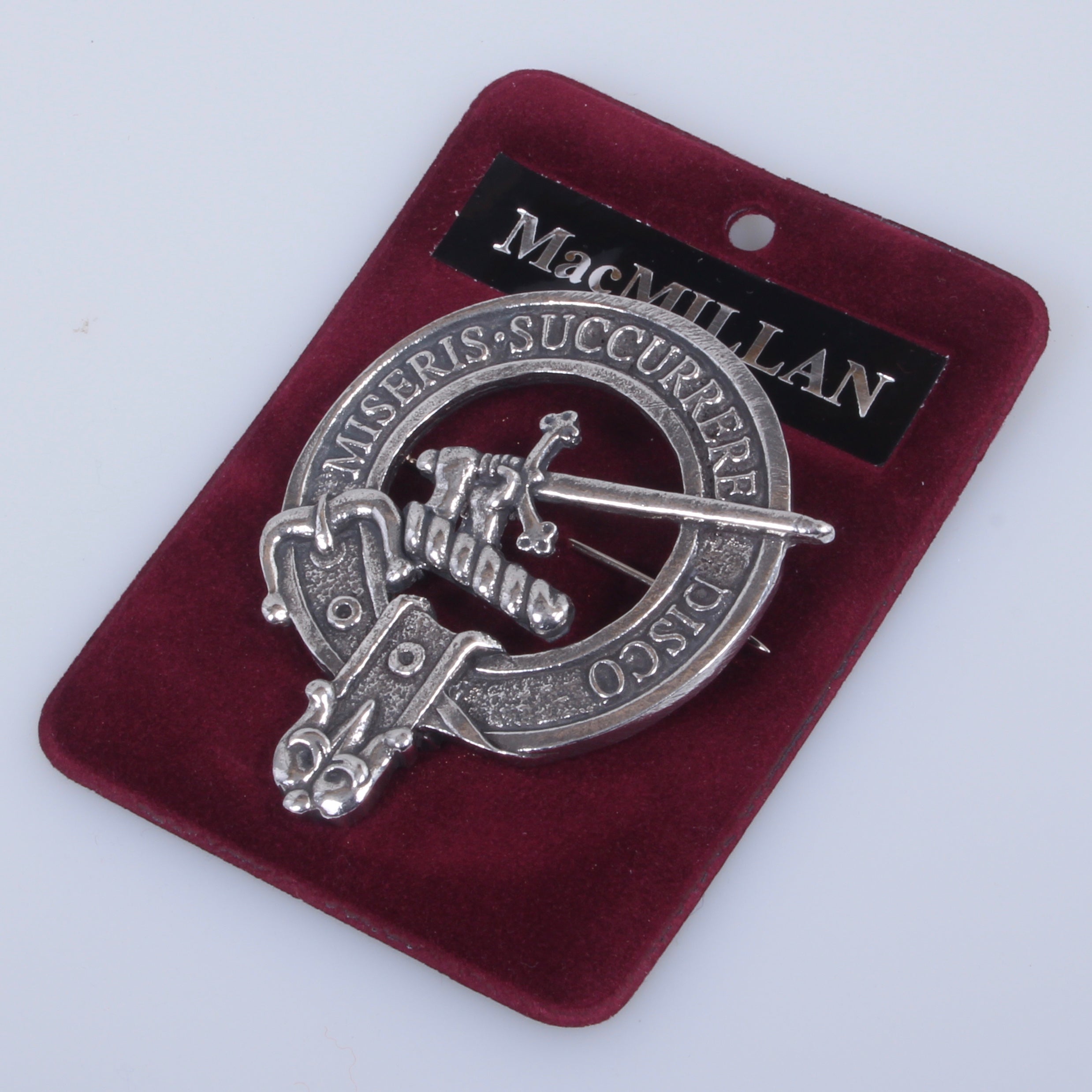 MacMillan Clan Crest Badge in Pewter, featuring a traditional belted design, ideal for wearing as a cap badge or large brooch pin, size 2" x 2.5".