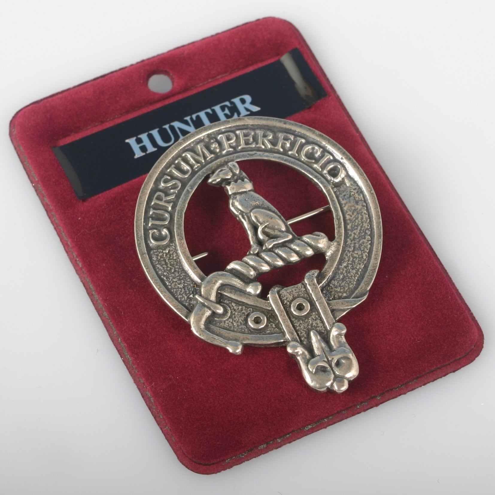 Hunter Clan Crest Badge in Pewter featured as a cap badge or brooch pin, highlighting the intricate design and traditional belted style representing clan heritage.