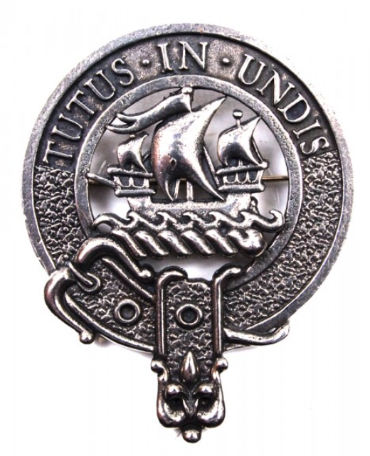 Wood Clan Crest Badge in Pewter worn as a brooch pin highlighting its use at clan gatherings.