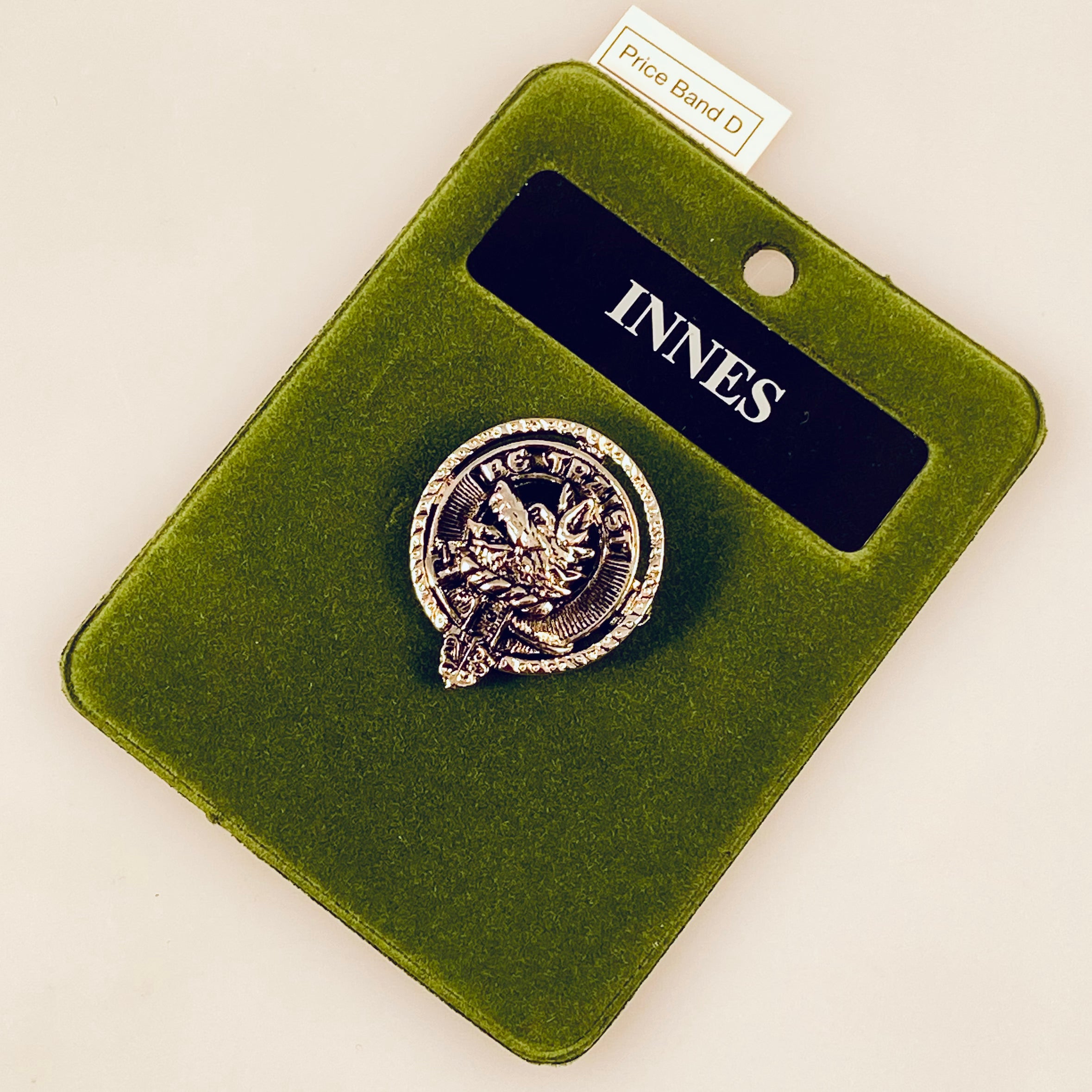 Innes Clan Crest Small Pewter Pin Badge showcasing Scottish heritage, perfect for wearing as a brooch or lapel pin.