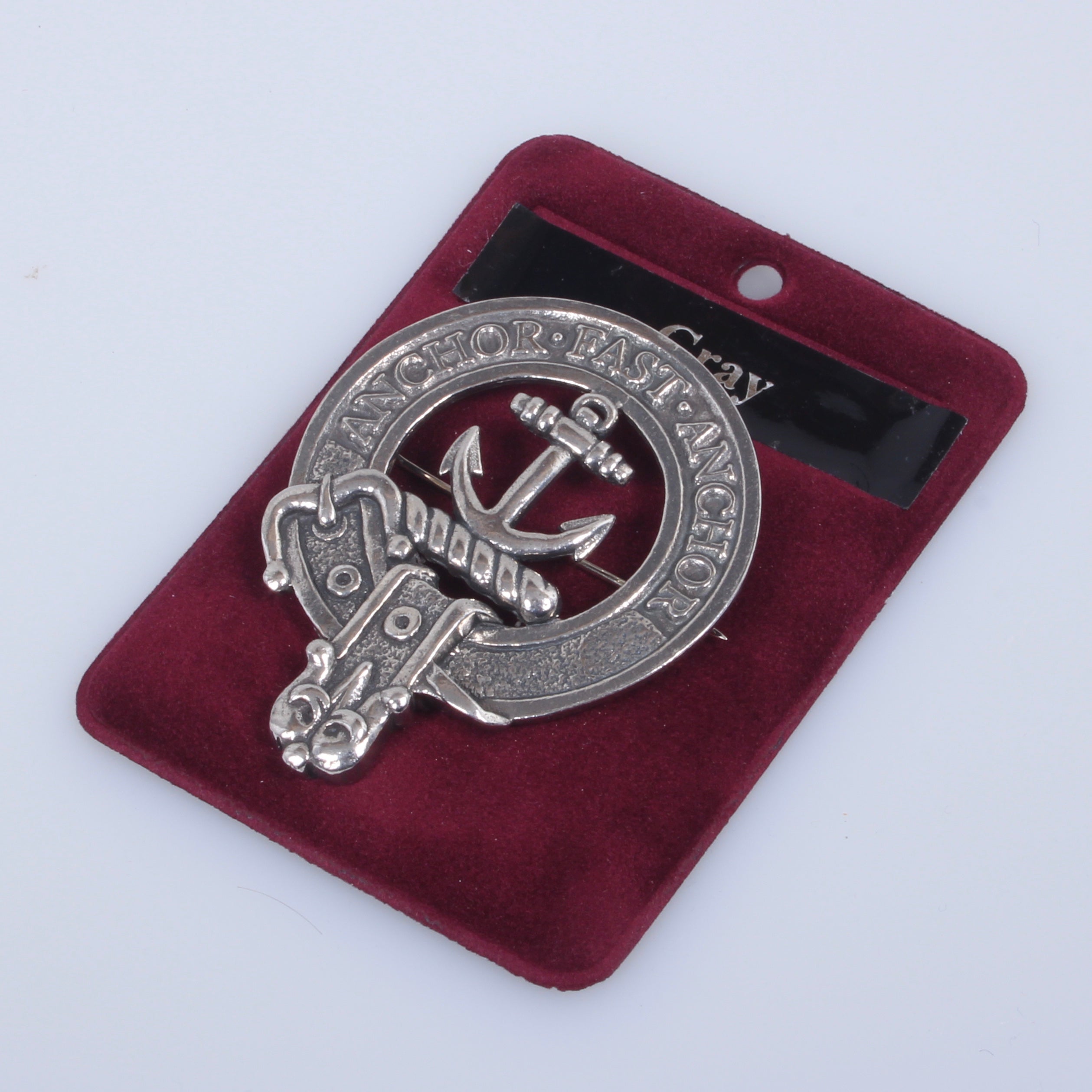 Gray Clan Crest Badge in Pewter featuring a traditional belted design, perfect for cap or brooch pin use, ideal for clan gatherings.