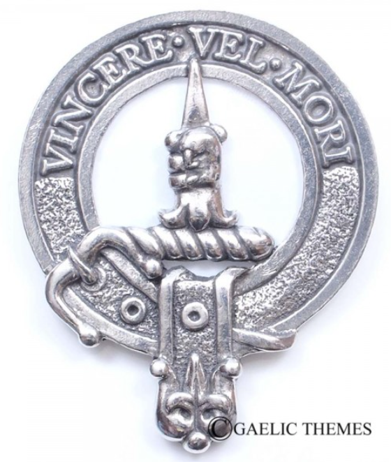 Close-up of the MacDowal Clan Crest Badge in Pewter, showcasing the traditional belted design and strong safety pin for everyday wear.