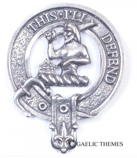 MacFarlane Clan Crest Badge in Pewter displayed on a soft fabric background, showcasing its detailed belted design and traditional locking pin feature, perfect for everyday wear or clan gatherings.