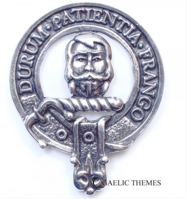 Muir Clan Crest Badge in Pewter showcasing the traditional belted design, perfect for clan gatherings and everyday wear.