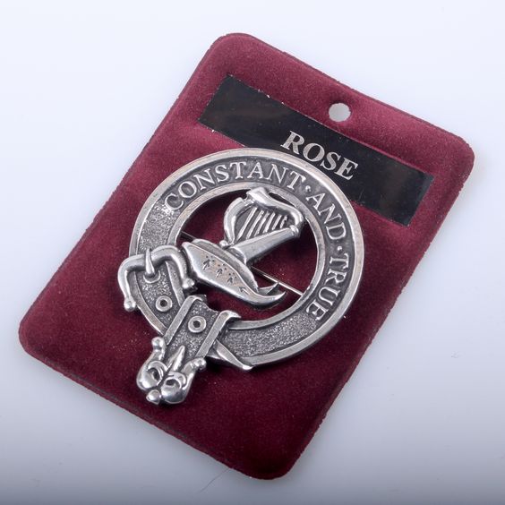 Rose Clan Crest Badge in Pewter, featuring a traditional belted design, perfect for everyday wear and special clan gatherings. Size: approximately 2" x 2.5".