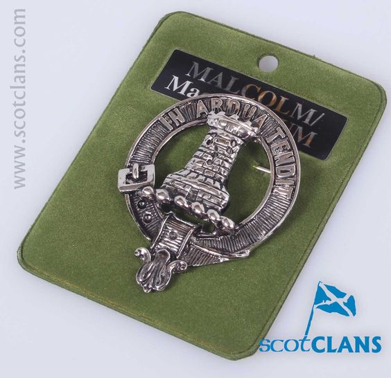 Malcolm Clan Crest Badge in Pewter featuring a luxurious palladium finish, ideal for showcasing Scottish heritage as a cap badge or brooch pin.